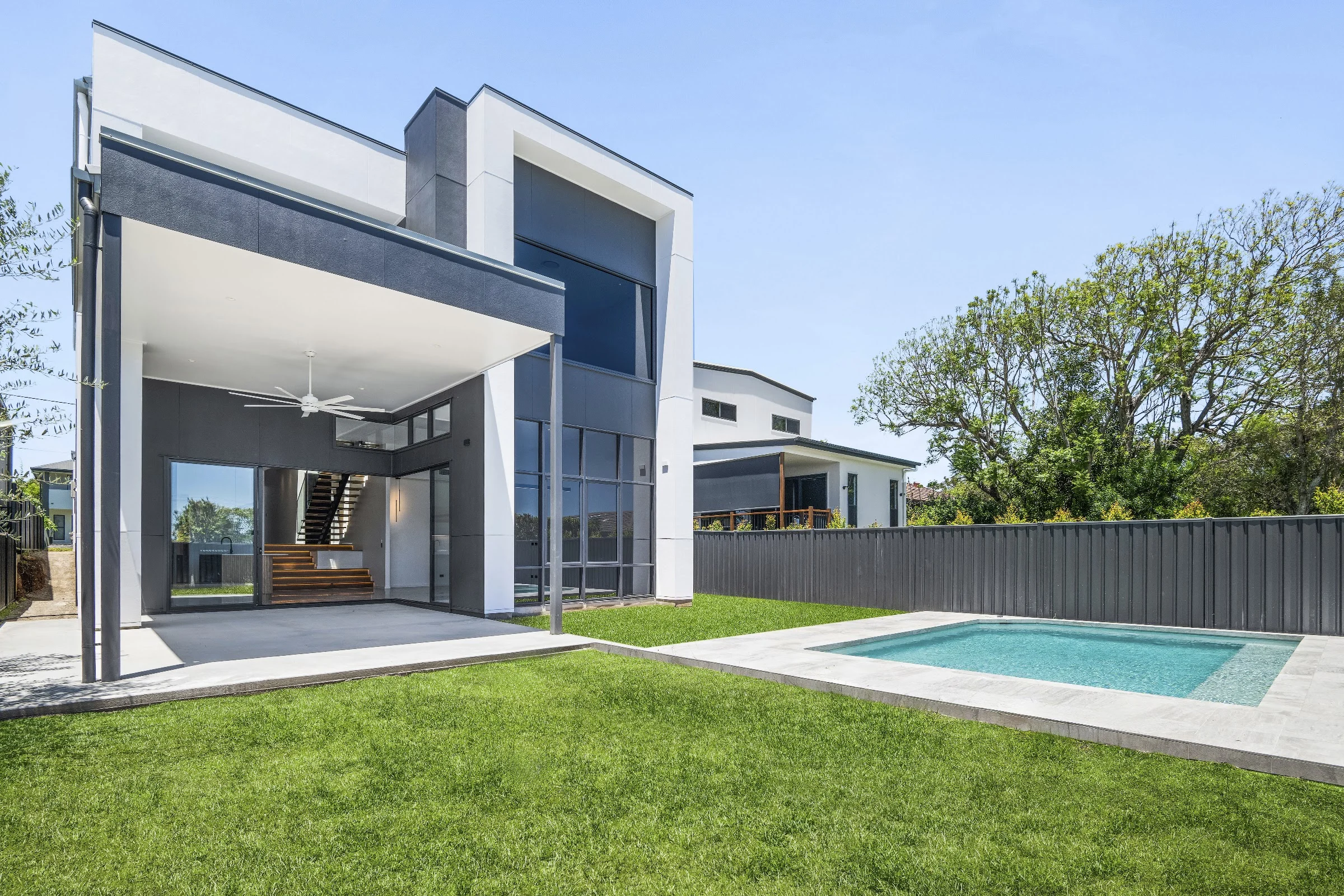 Modern two storey Arcadia home with a pool on a built-up block